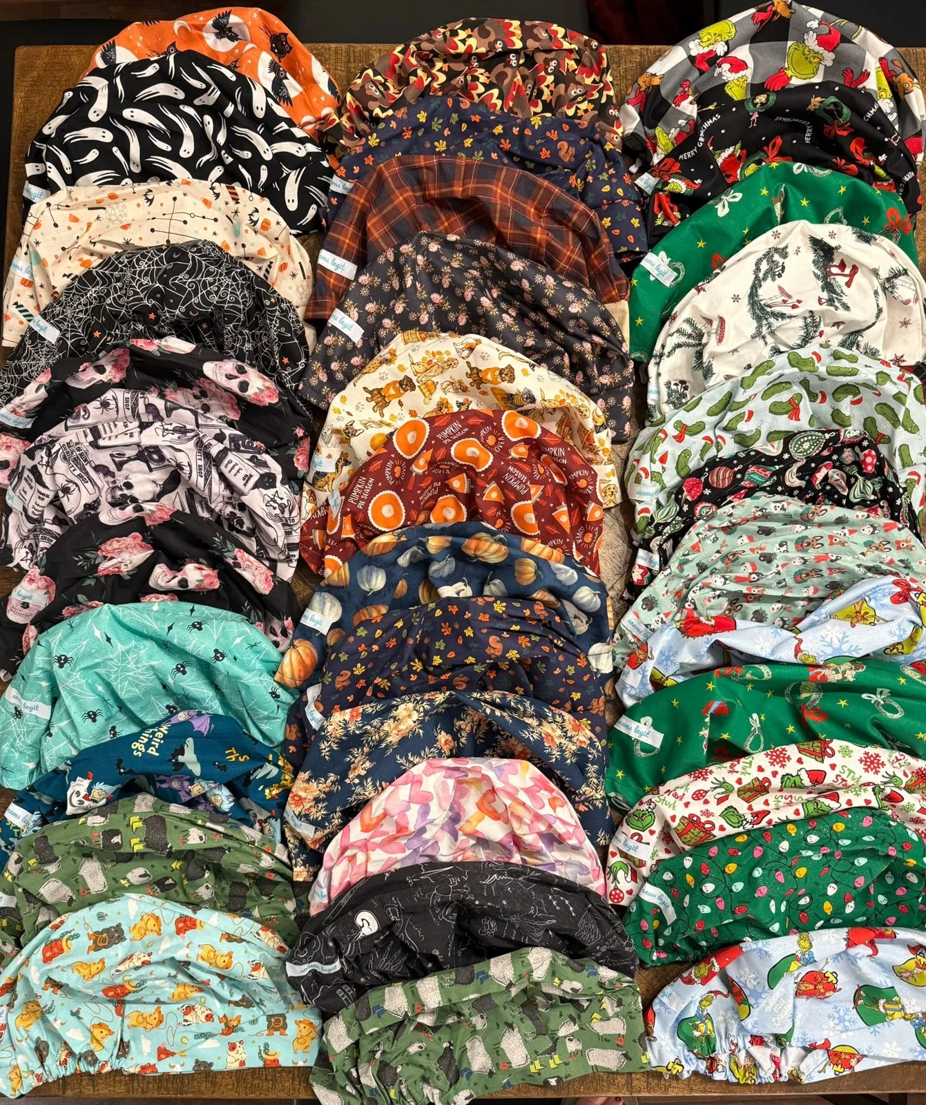 A colorful assortment of handmade bouffant scrub hats